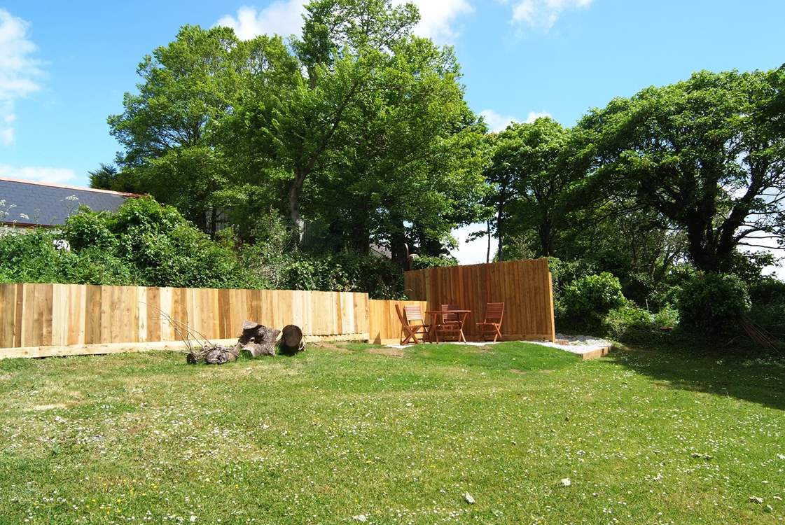 The south-facing 'meadow' garden includes your private sheltered patio and barbecue-area.