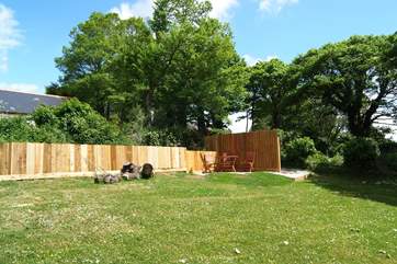 The south-facing 'meadow' garden includes your private sheltered patio and barbecue-area.