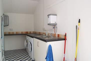 The separate utility-room is located behind the cottage next door. (New photo to follow)