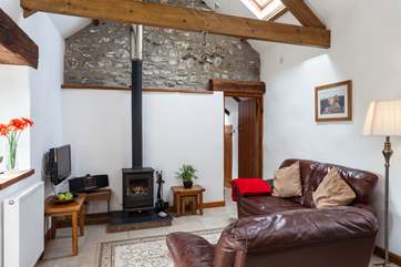 The cosy lounge, with lovely wood-burner.