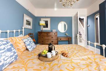 Bedroom 2 has a lovely king-size bed and stylish furnishings.