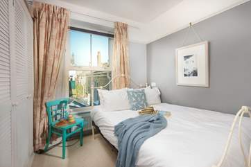 Bedroom 1 has a cosy double bed with access from one side only.