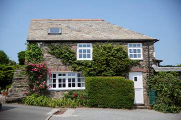 The cottage is as pretty as any could be.