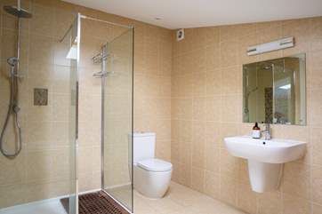 The en suite is simply stunning and the walk in shower has a drench shower head.