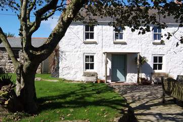 The separate wet-room is on the left-hand side of the farmhouse.