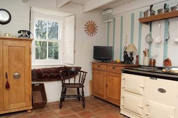 Relax in front of the Aga.
