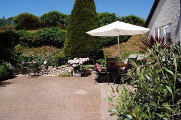 There is plenty of space for your car at the side of the cottage, keeping the patio clear so that you can enjoy sitting there.