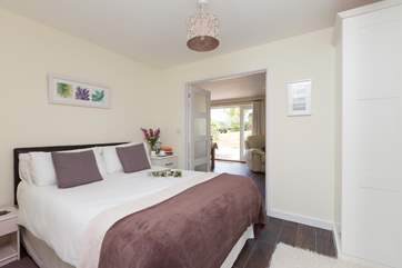 The master bedroom has double doors off the living-area.