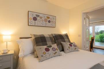 The main bedroom has a brand new, super comfy, king-sized bed.