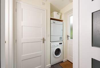 By the entrance door is your utility-area and to the left of it the cloakroom.