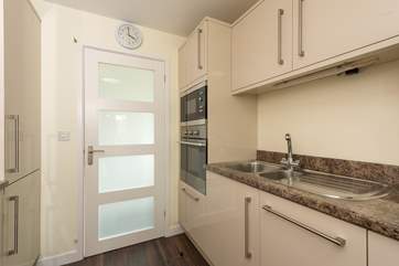There is an integrated oven and microwave.