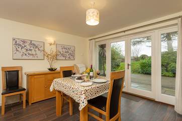 Another view of the dining-area of this lovely one-level cottage.