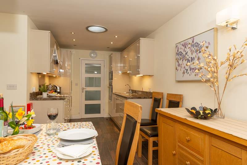 Beyond the kitchen door is the utility-area, a downstairs cloakroom and your side entrance door. You can access the second bedroom this way too.