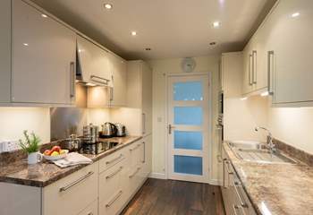 There is an immaculate kitchen with absolutely all you will need during your stay here