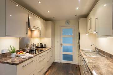 There is an immaculate kitchen with absolutely all you will need during your stay here
