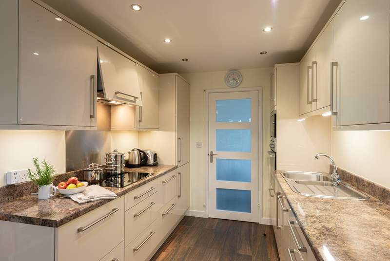 There is an immaculate kitchen with absolutely all you will need during your stay here