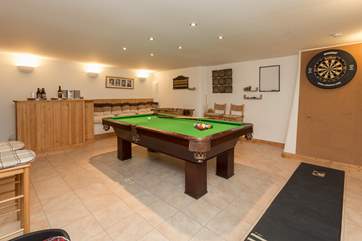 On the ground floor there is a wonderful games-room for guests to enjoy. There is even a little honesty bar! The utility-room is next door.