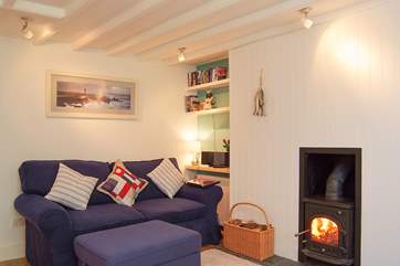 The sitting-room has a roaring wood-burner.