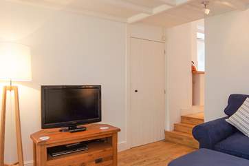 The sitting-room has three steps to the open plan living-room.