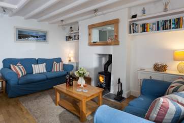 The sitting-room has a roaring wood-burner. Perfect for those chillier evenings.