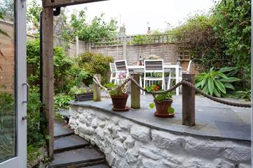 Lovely slate steps (seven in total) take you up to the terrace area.