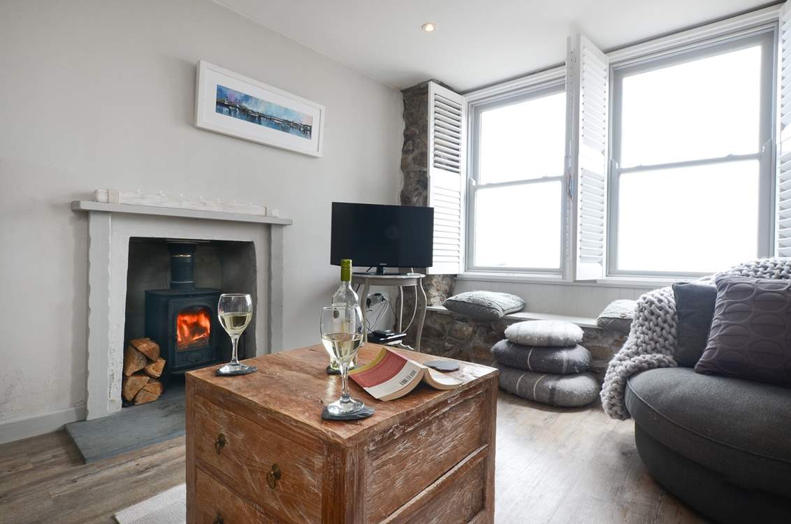 A roaring wood-burner in the sitting-area.