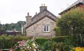 A view of this pretty end of terrace cottage, taken from the neighbouring gardens. - Thumbnail Image