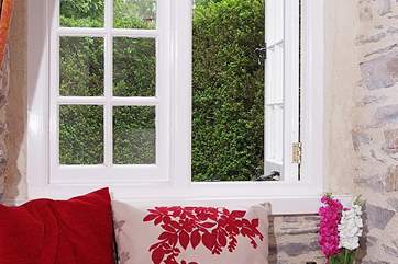 There is a pretty window seat in the sitting-room.