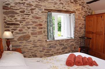 Another view of the bedroom. Take care of the step to the little landing and to the bathroom.