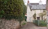 This is the entrance to Rosemary Lane. Lane Cottage is off a tiny square with private parking at the end of the lane. - Thumbnail Image