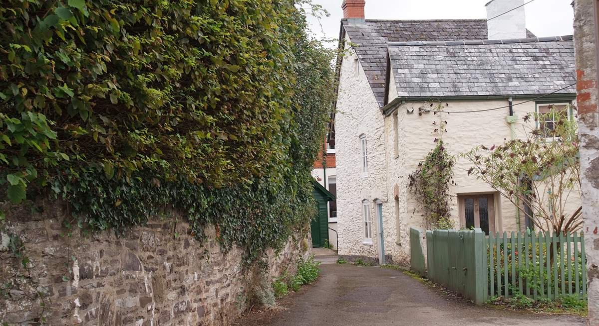 This is the entrance to Rosemary Lane. Lane Cottage is off a tiny square with private parking at the end of the lane.