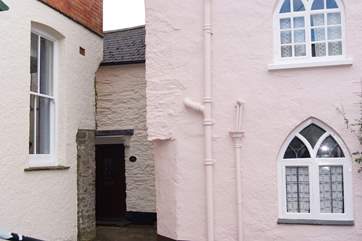 The black is the front of Lane Cottage - the key safe and back door are around to the left, down the passage.