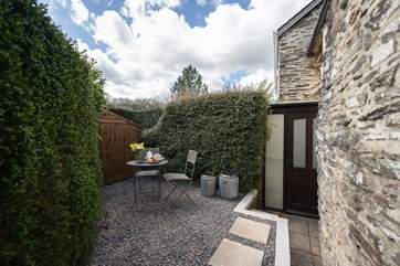 A view of the very sheltered patio at the rear of the cottage.