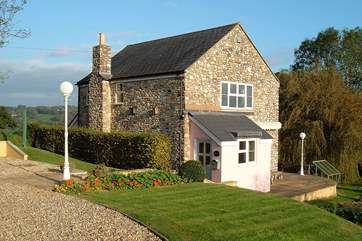 This lovely detached house is in a wonderful position, surrounded by the beautiful countryside of the Yarcombe Valley.