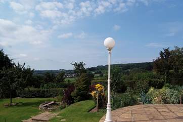 This is the view from the patio, looking across the garden that you are invited to enjoy, towards Yarcombe in the distance.