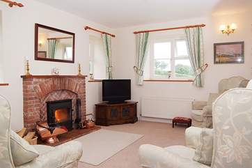 The sitting-area is a cosy and comfortable place to return to after a day out exploring. The reverse level accommodation really makes the most of the views.