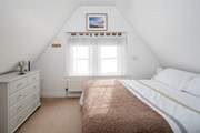 Bedroom 2 has a characterful sloping ceiling - and therefore a slightly lower than standard, 4ft 6' double bed.