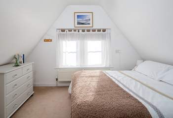 Bedroom 2 has a characterful sloping ceiling - and therefore a slightly lower than a standard 4ft 6' double bed.