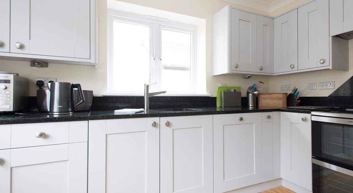 The kitchen with plenty of worktop space for preparing a culinary delight. 