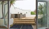 The decked terrace, accessed via the sitting-room. - Thumbnail Image