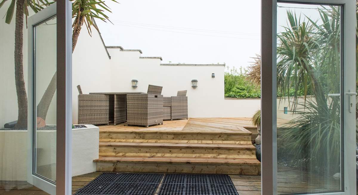 The decked terrace, accessed via the sitting-room.