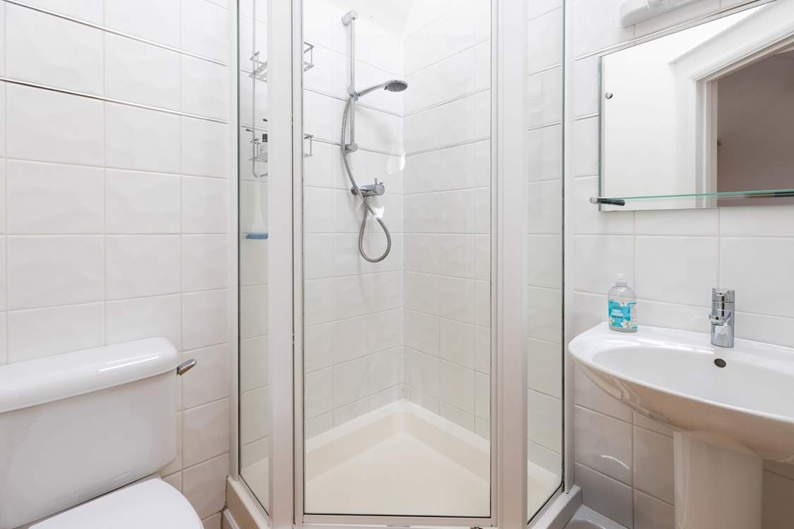 Bedroom 1 has an en suite shower-room.