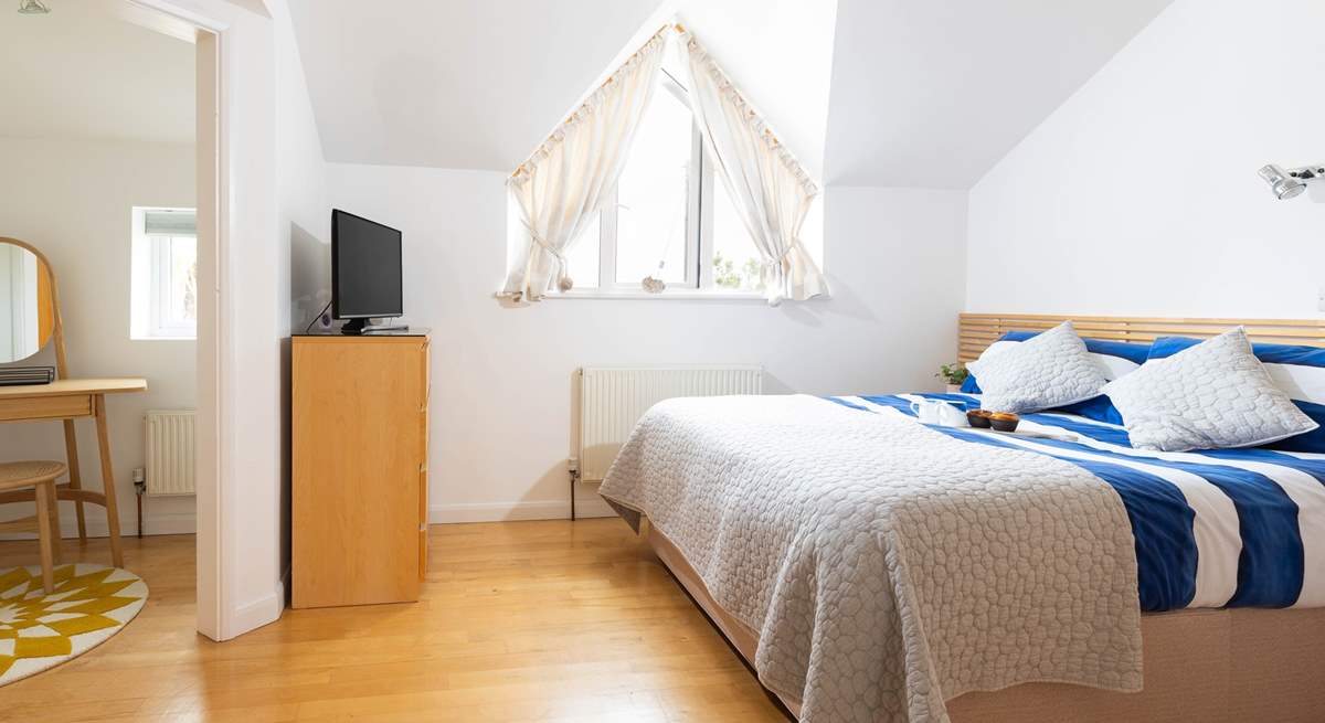 Large bedroom 1 offers privacy and comfort.