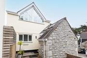 Driftwood is an attractive semi-detached cottage with a private decked back garden.