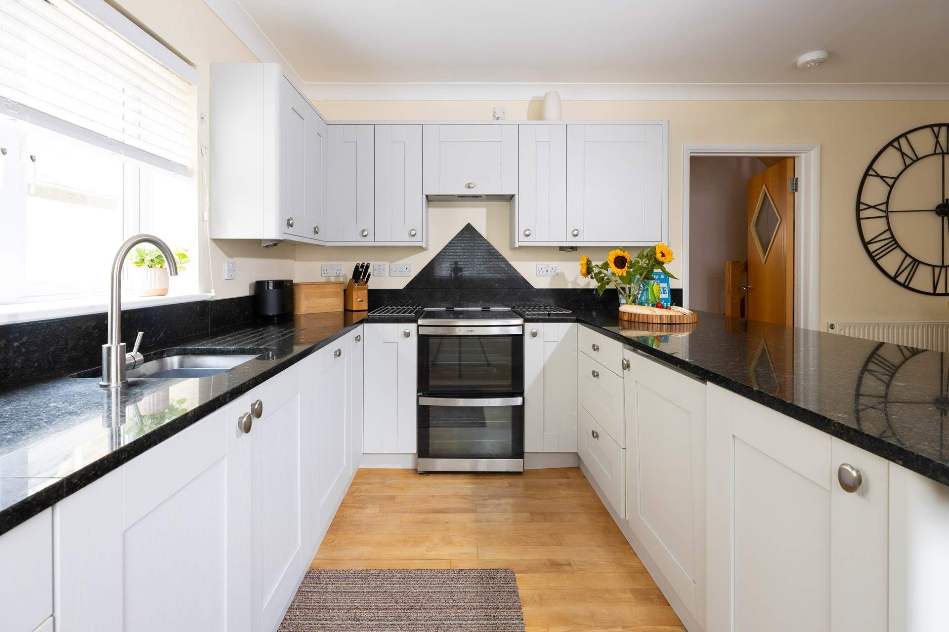 A stylish kitchen so very well-equipped.