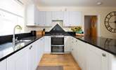 A stylish kitchen so very well-equipped. - Thumbnail Image