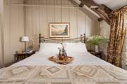 Pretty bedroom 2 has a double bed.