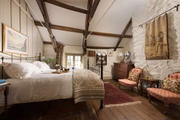 Bedroom 1 has beautiful antique furniture and a gorgeous brass bedstead.