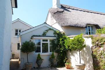 The front door of the cottage is on the left of the photo and this is the sitting-room window.
