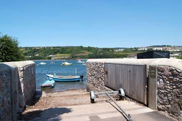 The slipway just past the front door; the cottage has enough parking for a dinghy or small boat trailer.